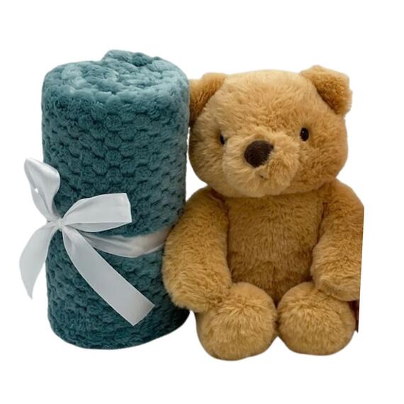 Coffret cadeau pour bébé comprenant une couverture douce en polaire et un ours en peluche ou un lapin en peluche.